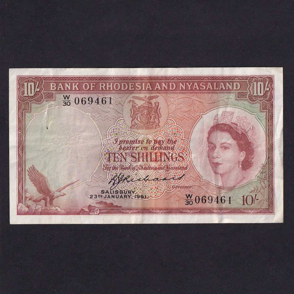 Rhodesia & Nyasaland (P20b) 10 Shillings, 23rd January 1961, QEII, Richards signature, large staple hole, VF