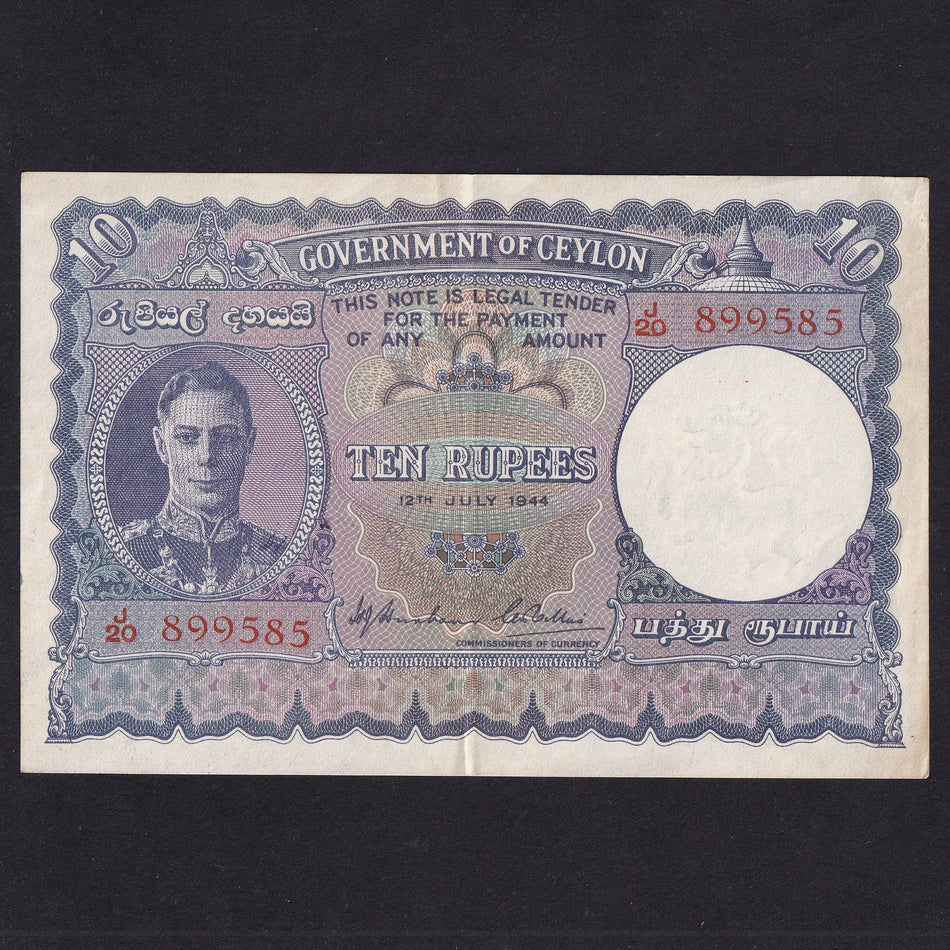 Ceylon (P36Aa) 10 Rupees, 12th July 1944, KGVI, J20 899585, slight rust, Good VF