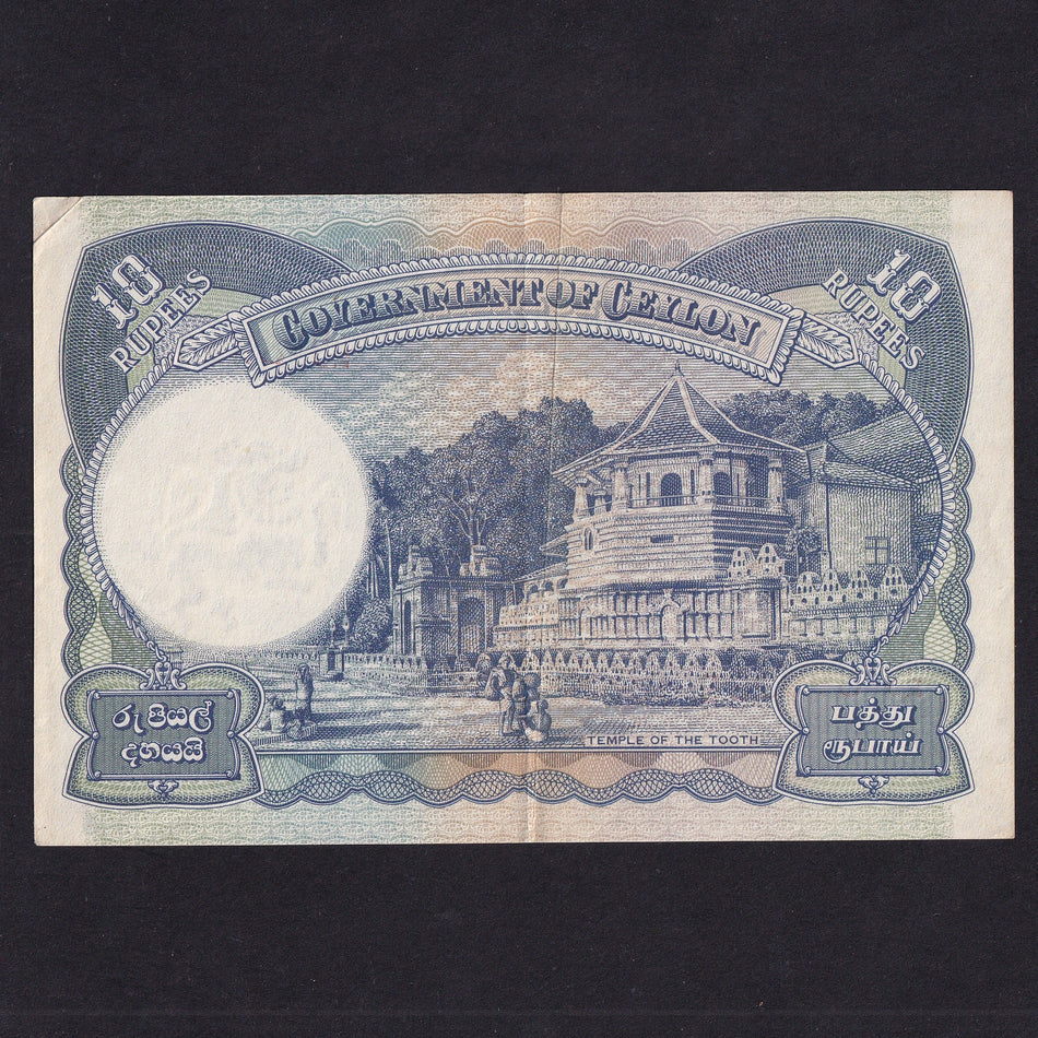 Ceylon (P36Aa) 10 Rupees, 12th July 1944, KGVI, J20 899585, slight rust, Good VF